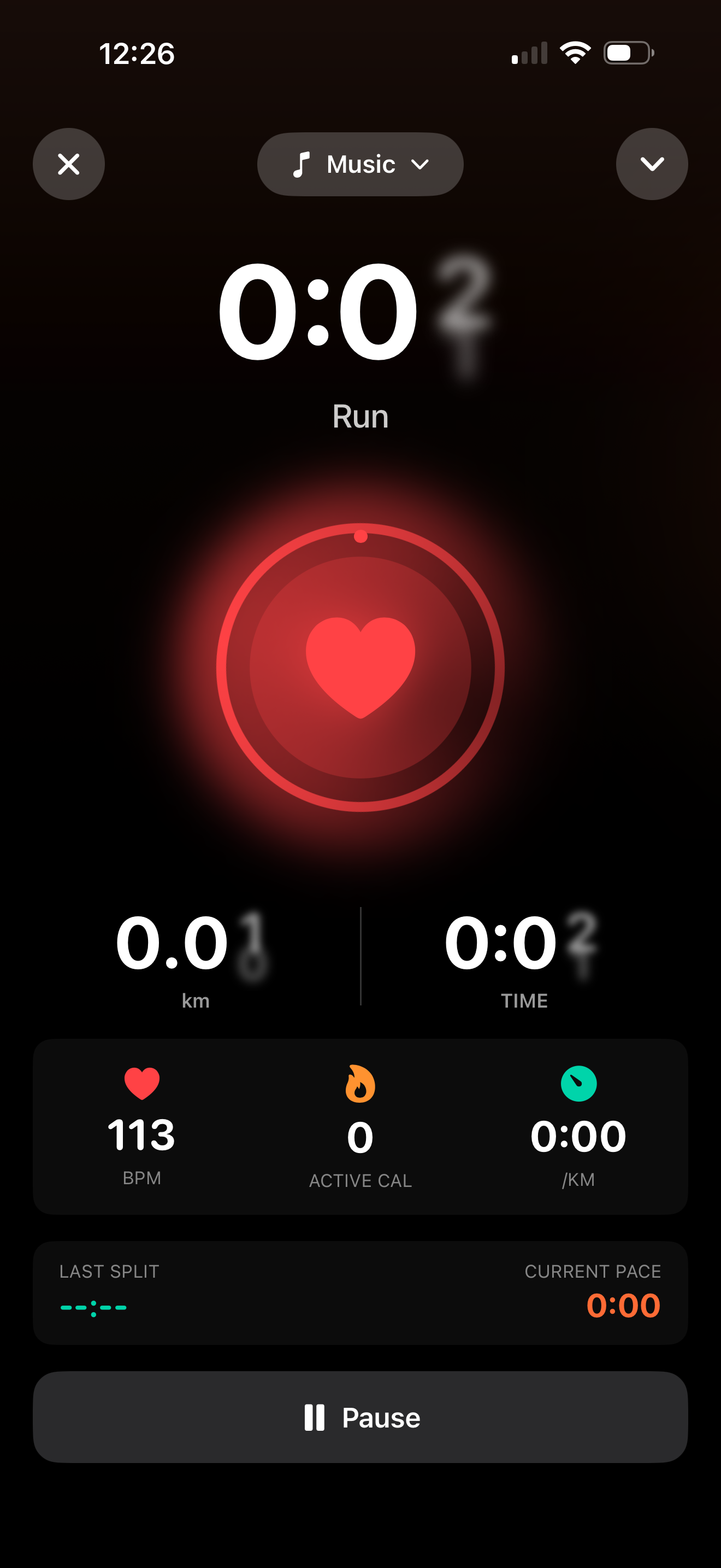 Active run workout with heart rate ring, timer and live metrics